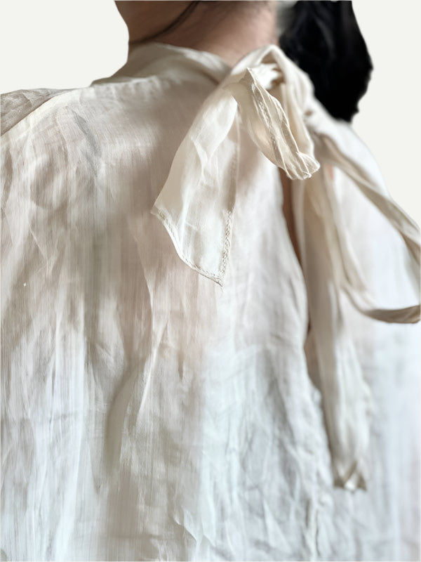 Back view of Batwing Sleeves Cream Lace-Up Linen Shirt.