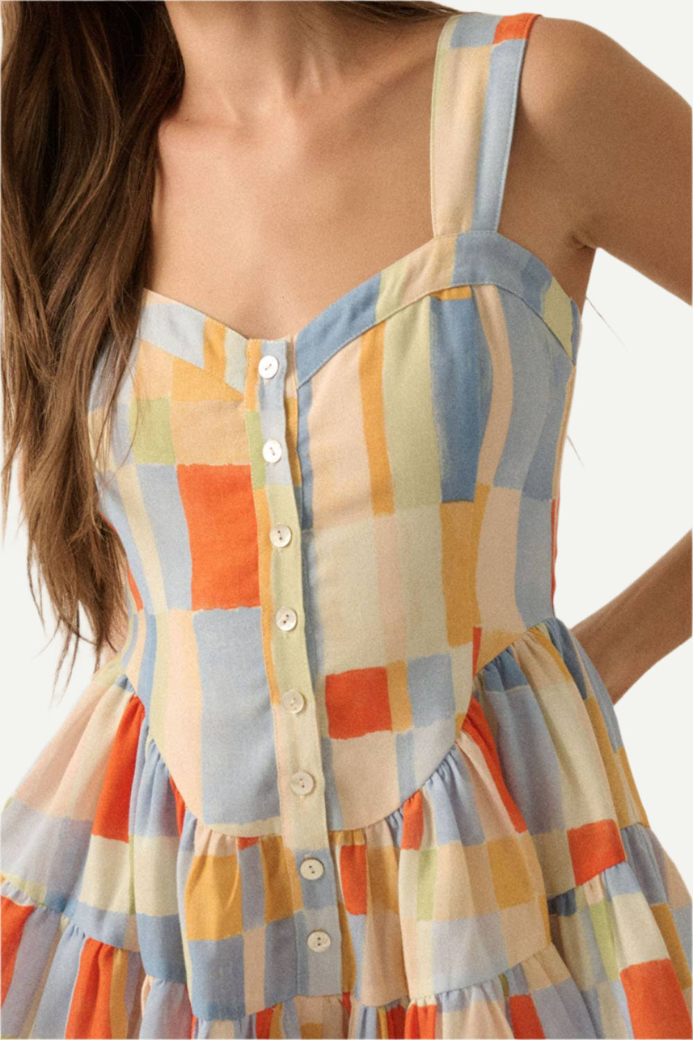 Close up of Blue Butter Romper Dress showing button detail at the front.