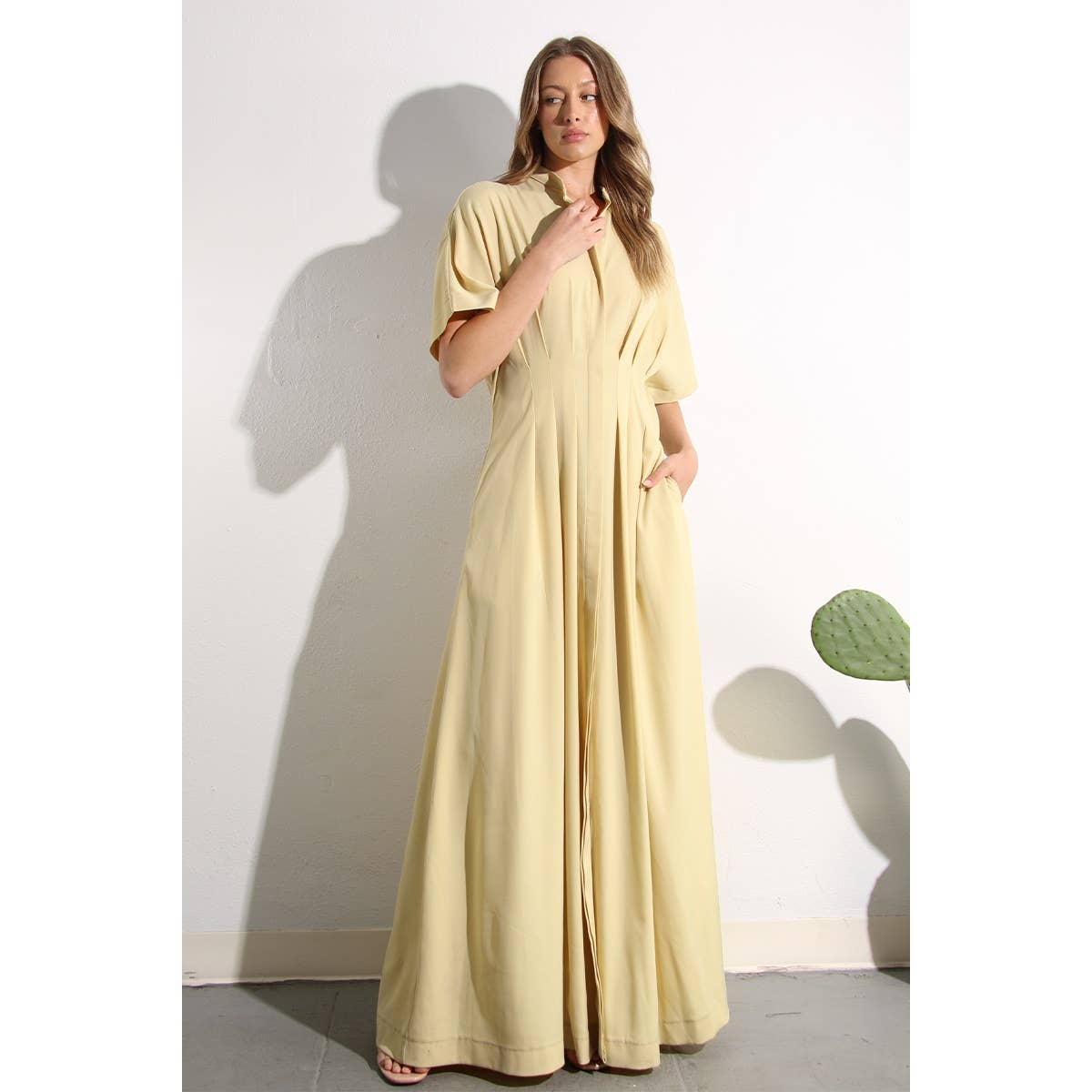 Model showing collar on North and Five's Butter Yellow Long Button-Down Dress.