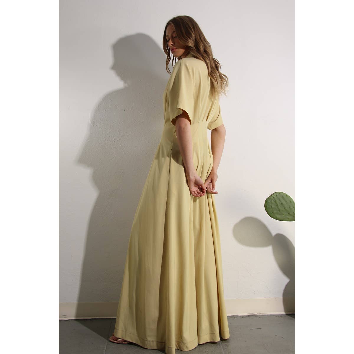 Side view of North and Five's Butter Yellow Long Button-Down Dress