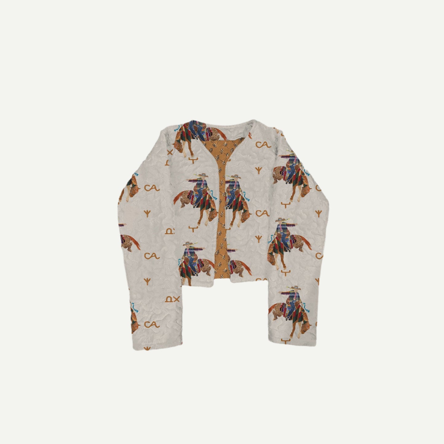 Cropped linen jacket with quilted patchwork and Western-inspired design details.