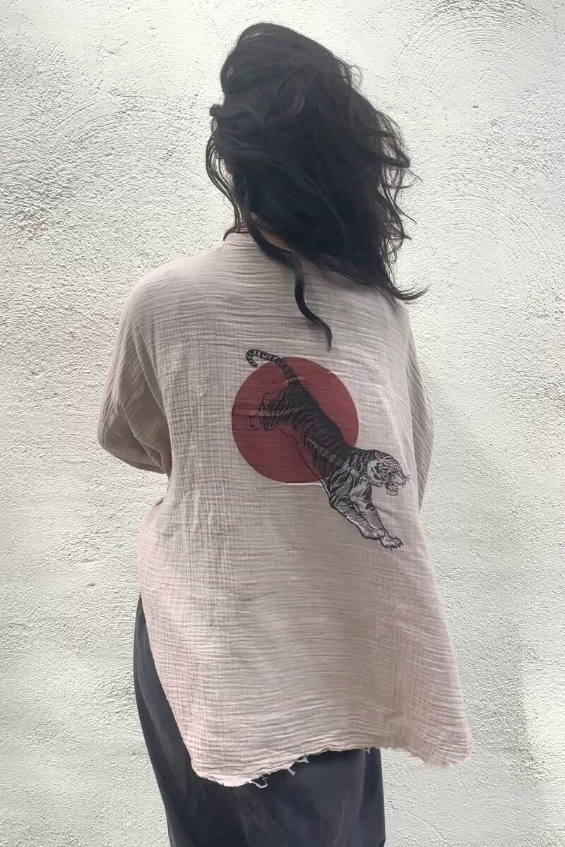 Lightweight white muslin kimono robe with a relaxed drape and, tiger in sun graphic on back.